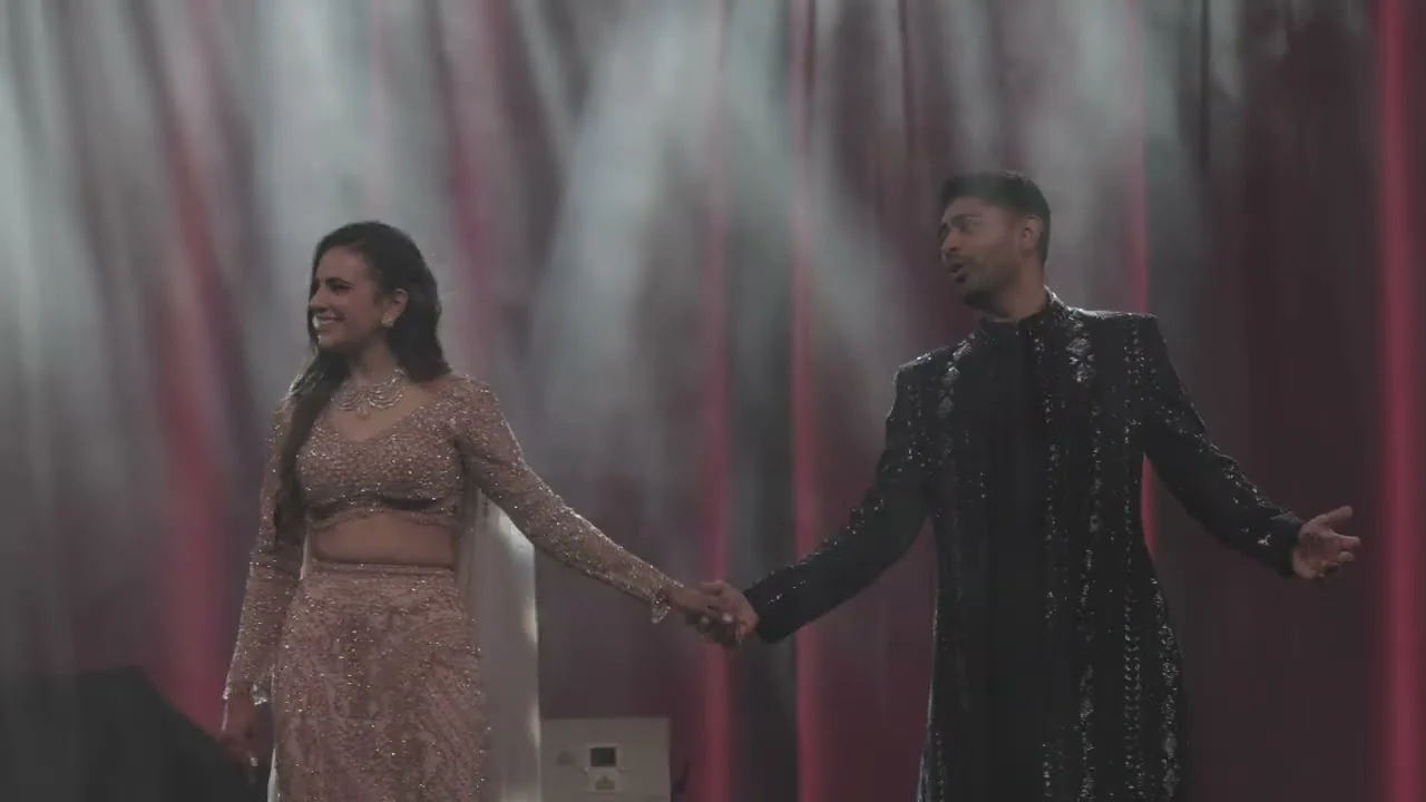 Bride and groom performing in the featured playlist